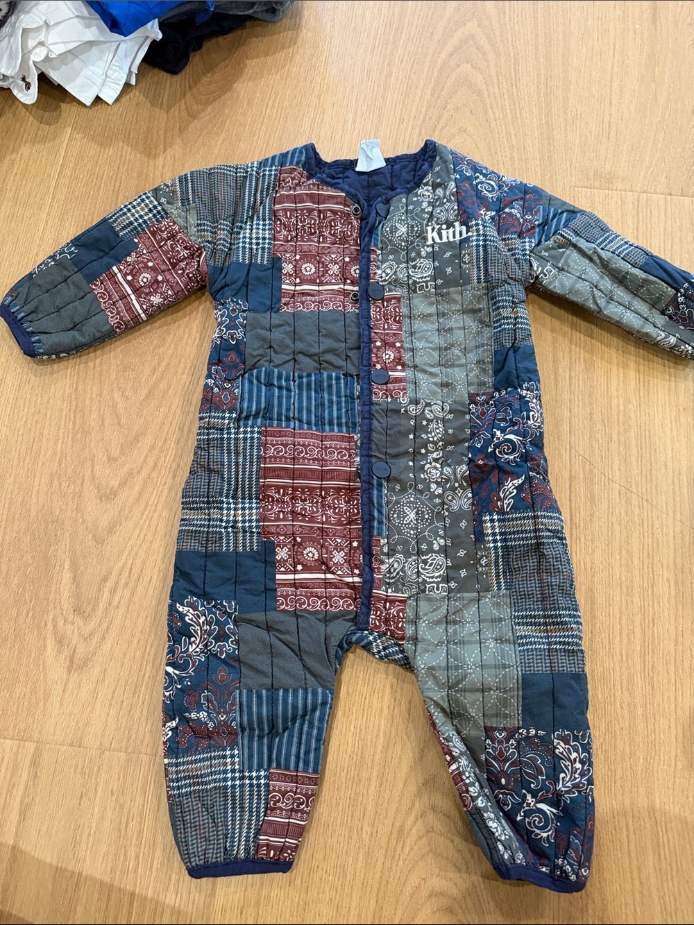 Kith Quilted Patchwork Baby One-Piece - Navy, Red, Gray